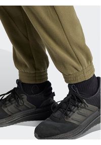 Adidas - adidas Spodnie dresowe Future Icons 3-Stripes IJ8859 Zielony Regular Fit. Kolor: zielony. Materiał: syntetyk #5