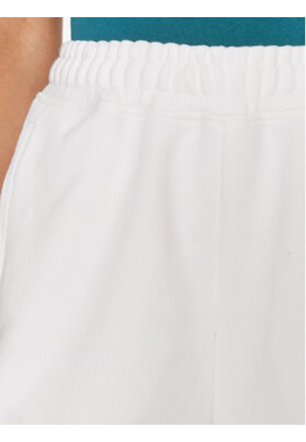 Tommy Jeans Szorty sportowe New Cls DW0DW17772 Biały Relaxed Fit. Kolor: biały. Materiał: bawełna