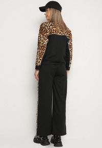 Born2be - Czarny Komplet Dresowy Bluza ze Stójką i Szerokie Spodnie w Panterkę Savorre. Kolor: czarny. Materiał: dresówka. Wzór: motyw zwierzęcy