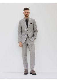 Reserved - Spodnie garniturowe slim fit - brązowy. Kolor: brązowy. Materiał: tkanina, wiskoza #1