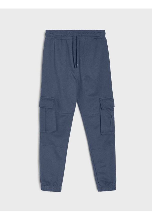 Sinsay - Spodnie dresowe cargo loose - mid blue. Materiał: dresówka