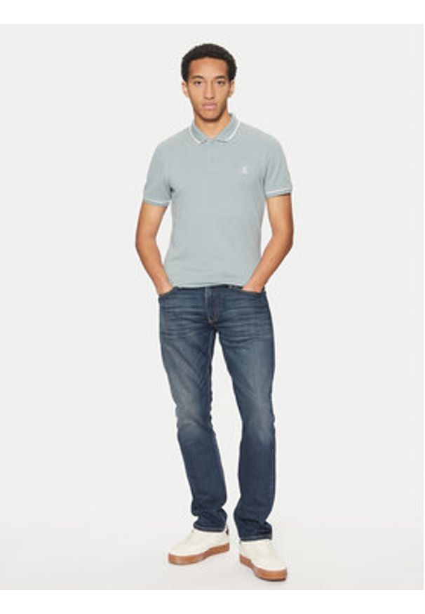 Calvin Klein Jeans Polo J30J315603 Niebieski Slim Fit. Typ kołnierza: polo. Kolor: niebieski. Materiał: bawełna