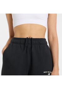 Spodnie damskie New Balance WP51500BK – czarne. Stan: podwyższony. Kolor: czarny. Materiał: bawełna, dresówka, poliester #5