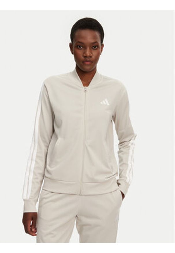 Adidas - adidas Dres Essentials 3-Stripes JD2686 Beżowy Regular Fit. Kolor: beżowy. Materiał: syntetyk
