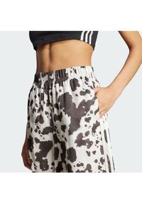 Adidas - adidas Spodnie dresowe Satin KA2668 Brązowy Wide Leg. Kolor: brązowy. Materiał: syntetyk #2