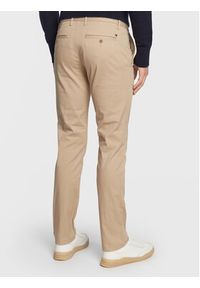 TOMMY HILFIGER - Tommy Hilfiger Chinosy Core Bleecker MW0MW28883 Beżowy Slim Fit. Kolor: beżowy. Materiał: bawełna