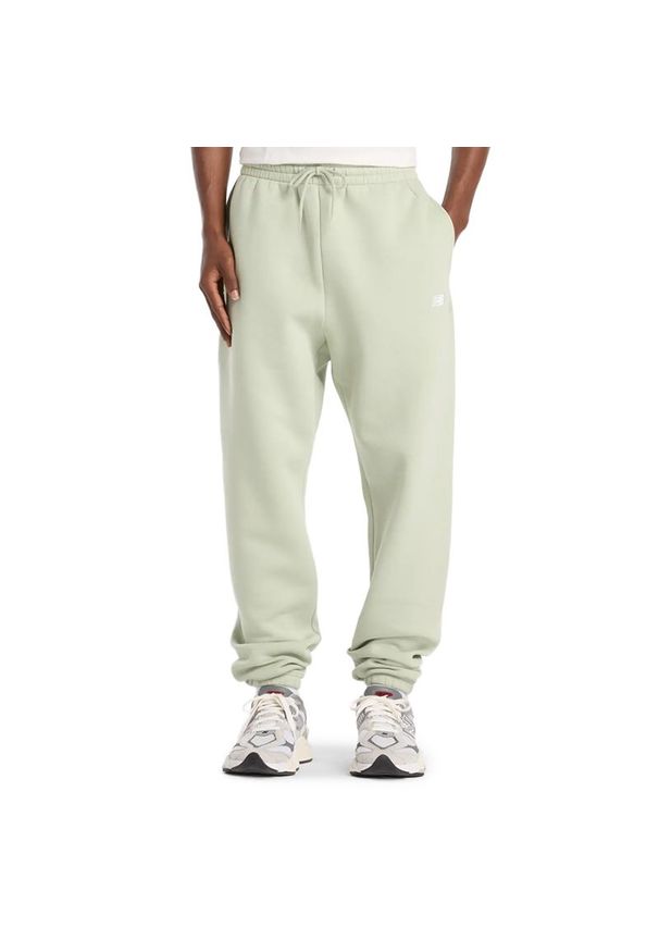Spodnie męskie New Balance MP41503GAS - miętowe. Kolor: miętowy. Materiał: poliester, bawełna, materiał, dresówka