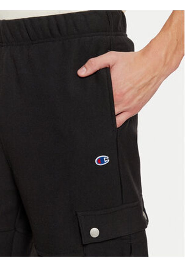 Champion Spodnie dresowe 220710 Czarny Loose Fit. Kolor: czarny. Materiał: bawełna