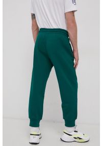 adidas Performance Spodnie bawełniane męskie kolor zielony gładkie. Kolor: zielony. Materiał: bawełna. Wzór: gładki