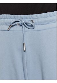 Calvin Klein Jeans Spodnie dresowe J20J220261 Błękitny Relaxed Fit. Kolor: niebieski. Materiał: bawełna #5