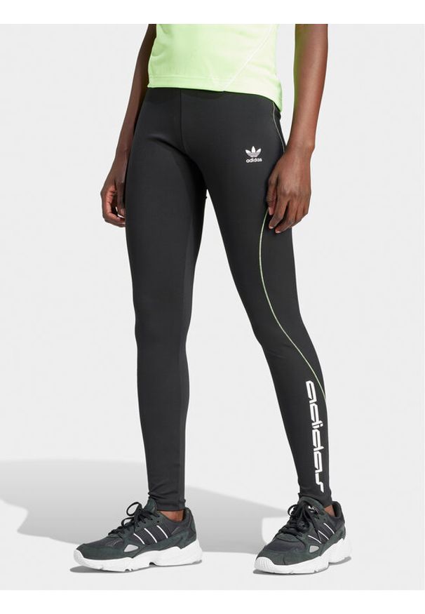 Adidas - adidas Legginsy Graphic IT9700 Czarny Slim Fit. Kolor: czarny. Materiał: syntetyk