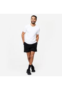 DOMYOS - Spodenki fitness męskie Domyos 100. Kolor: czarny. Materiał: poliester, materiał, bawełna. Wzór: ze splotem. Sport: fitness