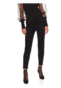 TOP SECRET - Jeansowe spodnie z gumą w pasie i aplikacją. Kolor: czarny. Materiał: guma, jeans. Długość: długie. Wzór: aplikacja. Sezon: zima. Styl: elegancki #1
