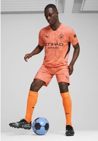 Puma - Szorty bramkarskie Manchester City 24/25 PUMA Neon Sun Orange. Kolor: żółty, pomarańczowy, wielokolorowy