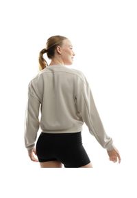 SIROKO - Bluza treningowa crop top dla kobiet Fitness Siroko Ignite. Kolor: beżowy. Materiał: materiał. Sport: fitness