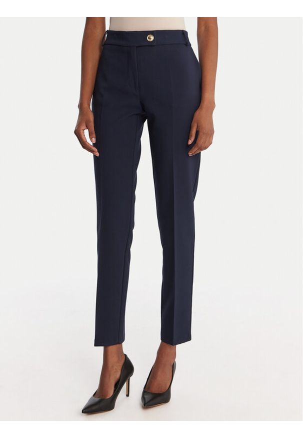 Rinascimento Chinosy CFC0126225003 Granatowy Slim Fit. Kolor: niebieski. Materiał: syntetyk