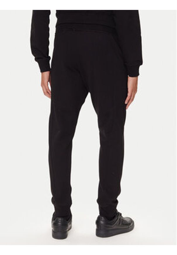 Versace Jeans Couture Spodnie dresowe 79GAAT05 Czarny Regular Fit. Kolor: czarny. Materiał: bawełna