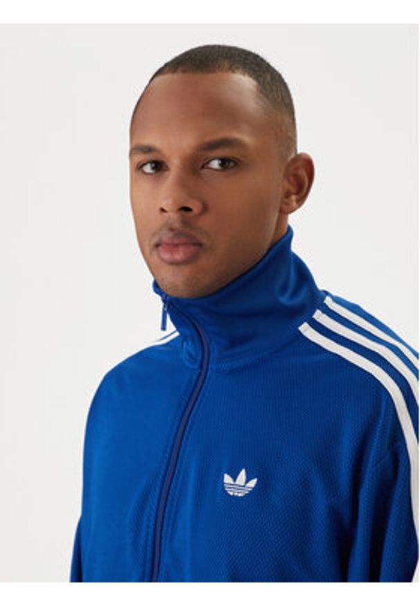 Adidas - adidas Bluza adicolor Firebird KE0790 Niebieski Loose Fit. Kolor: niebieski. Materiał: syntetyk