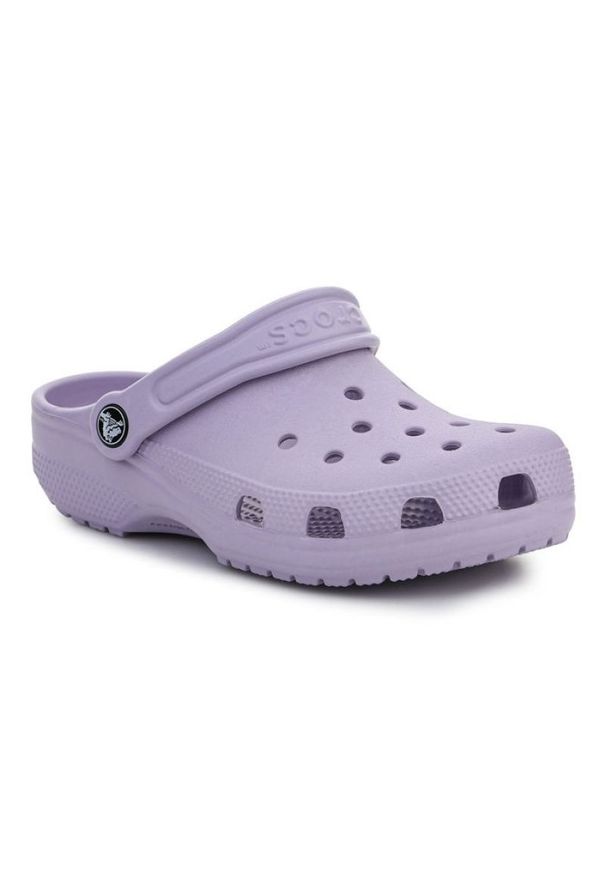 Klapki Crocs Classic Kids Clog 206991-530 fioletowe. Okazja: na plażę, na co dzień. Kolor: fioletowy. Materiał: syntetyk. Styl: klasyczny, wakacyjny, casual