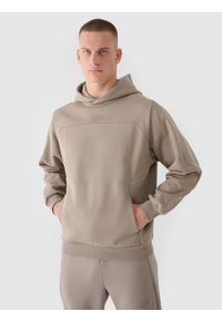 4f - 4F Bluza dresowa nierozpinana z kapturem męska 4F x Robert Lewandowski - khaki S. Okazja: na co dzień. Typ kołnierza: kaptur. Kolor: oliwkowy, wielokolorowy, brązowy. Materiał: dresówka. Długość rękawa: raglanowy rękaw. Wzór: aplikacja, gładki, ze splotem. Styl: sportowy, casual