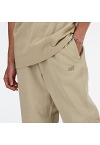 Spodnie męskie New Balance MP41508SOT – beżowe. Kolor: beżowy. Materiał: tkanina, bawełna, dresówka #5