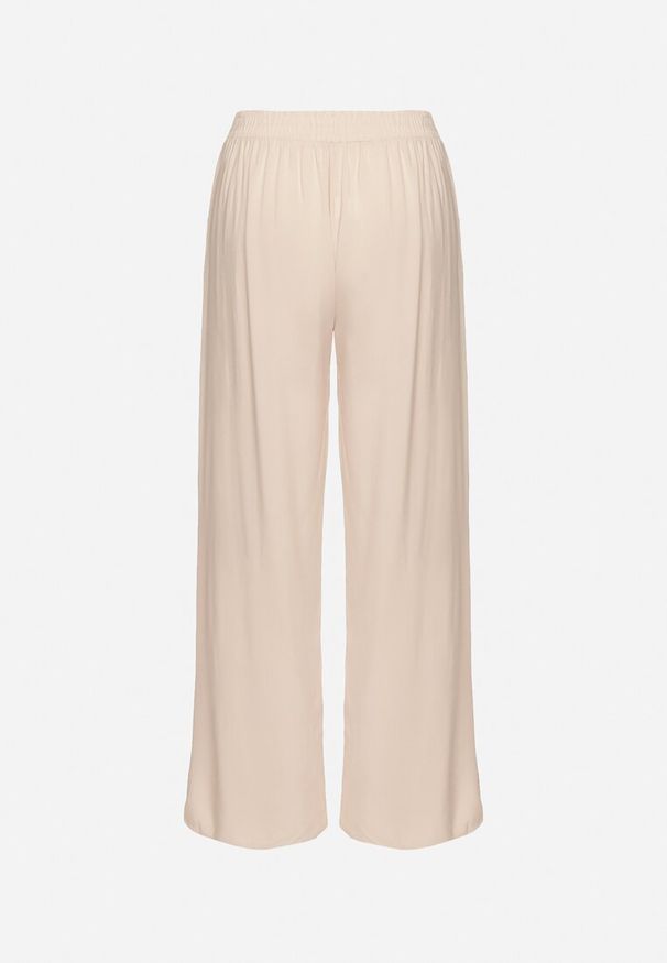 Born2be - Beżowe Wiskozowe Szerokie Spodnie z Wysokim Stanem Ozdobione Wiązaniem Lisozi. Okazja: na co dzień. Stan: podwyższony. Kolor: beżowy. Materiał: wiskoza. Wzór: aplikacja. Styl: elegancki, casual