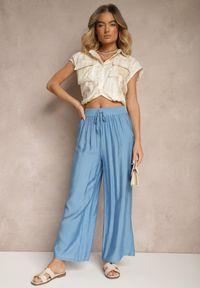 Renee - Niebieskie Spodnie Typu Palazzo o Szerokim Kroju High Waist Ozdobione Wiązaniem Yaslevia. Okazja: na co dzień. Stan: podwyższony. Kolor: niebieski. Wzór: aplikacja. Styl: elegancki, casual #5