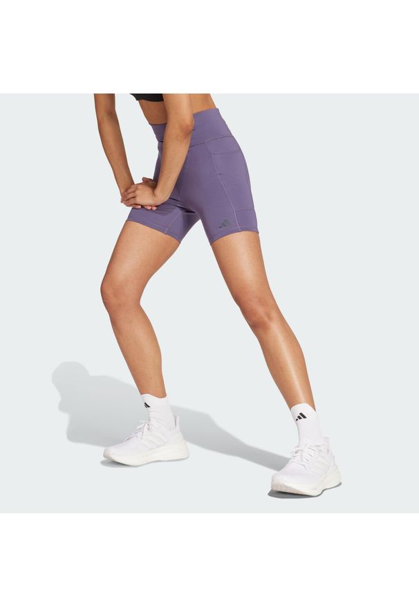 Adidas - Legginsy Own the Run Short. Kolor: fioletowy. Materiał: materiał. Długość: krótkie. Sport: bieganie