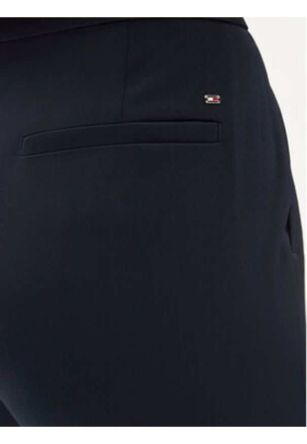 TOMMY HILFIGER - Tommy Hilfiger Spodnie materiałowe Gold Button WW0WW42455 Granatowy Flare Fit. Kolor: niebieski. Materiał: syntetyk