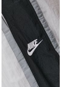 Nike Sportswear Spodnie męskie kolor szary gładkie. Kolor: szary. Materiał: tkanina. Wzór: gładki #6