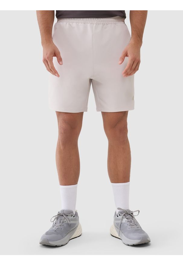 4f - 4F Spodenki treningowe szybkoschnące męskie - beżowe XL. Kolor: beżowy. Materiał: elastan, włókno, dzianina, materiał, syntetyk. Długość: krótkie. Wzór: ze splotem, gładki, jednolity. Sport: fitness