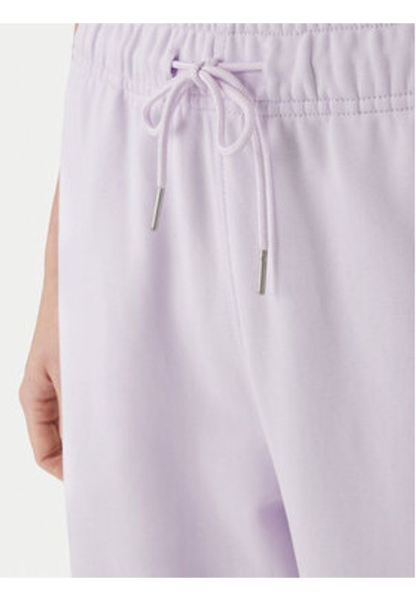 Calvin Klein Jeans Spodnie dresowe Embossed Monologo LV047F206G Różowy Regular Fit. Kolor: różowy. Materiał: bawełna