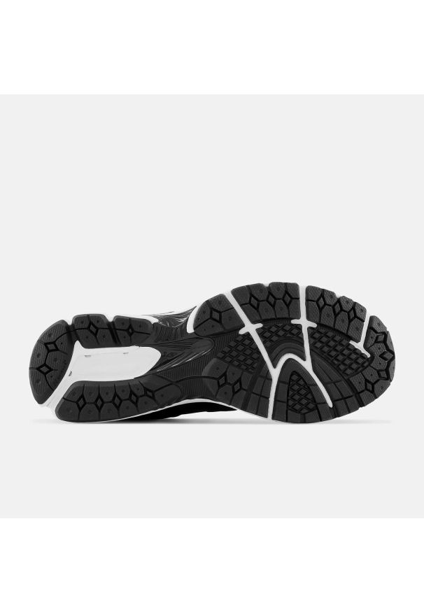 New Balance M2002RBK Sneakersy unisex czarny. Kolor: czarny. Materiał: materiał, syntetyk, guma, skóra. Szerokość cholewki: normalna. Sport: turystyka piesza