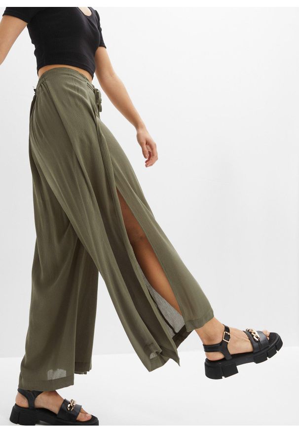 bonprix - Spodnie z lejącej wiskozy. Kolor: zielony. Materiał: wiskoza