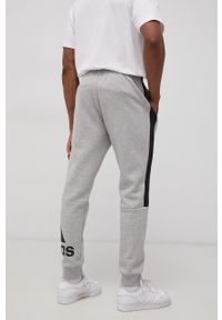 Adidas - adidas Spodnie HE4363 męskie z nadrukiem. Kolor: szary. Materiał: poliester, dzianina. Wzór: nadruk #2