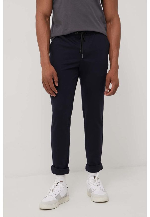 PRODUKT by Jack & Jones - Produkt by Jack & Jones spodnie męskie kolor granatowy gładkie. Kolor: niebieski. Materiał: dzianina. Wzór: gładki