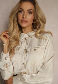 Renee - Czarno-Beżowy Kombinezon z Koszulową Górą Zdobiony Wiązaniem i Eleganckimi Guzikami Eliti. Okazja: na spotkanie biznesowe. Kolor: czarny. Długość rękawa: długi rękaw. Długość: długie. Wzór: aplikacja. Styl: elegancki #5