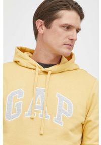 GAP bluza męska kolor żółty z kapturem z aplikacją. Typ kołnierza: kaptur. Kolor: żółty. Materiał: poliester. Wzór: aplikacja #2