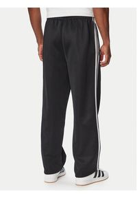 Adidas - adidas Spodnie dresowe adicolor Spacer KS7433 Czarny Baggy Fit. Kolor: czarny. Materiał: bawełna. Sport: turystyka piesza #2