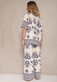 Renee - Niebieski Wiskozowy Komplet w Orientalny Print Szerokie Spodnie i T-shirt Pollialia. Kolor: niebieski. Materiał: wiskoza. Wzór: nadruk