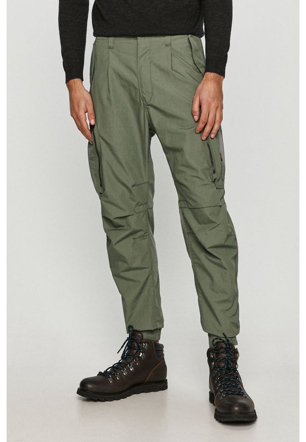 G-Star RAW - G-Star Raw - Spodnie. Kolor: zielony. Materiał: tkanina, bawełna, poliester, materiał. Wzór: gładki