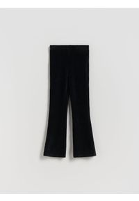 Reserved - Prążkowane legginsy flared - czarny. Kolor: czarny. Materiał: prążkowany #1