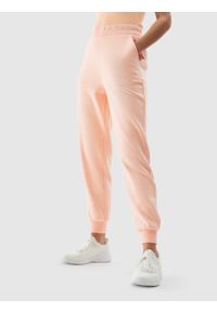 4f - Spodnie dresowe joggery damskie. Kolor: różowy. Materiał: dresówka. Długość: długie. Wzór: gładki