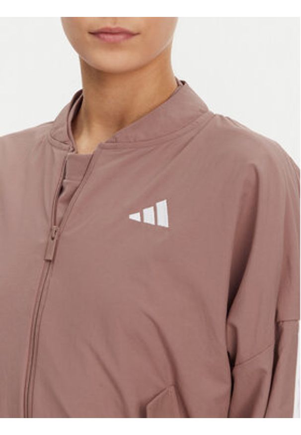 Adidas - adidas Kurtka bomber Essentials 3-Stripes JD5318 Różowy Loose Fit. Kolor: różowy. Materiał: syntetyk