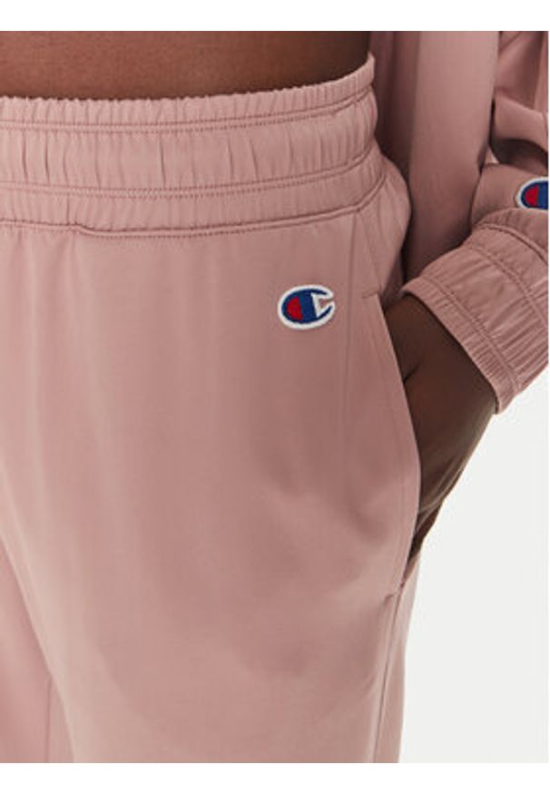 Champion Spodnie dresowe 116260 Różowy Regular Fit. Kolor: różowy. Materiał: syntetyk