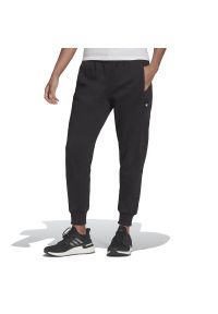 Adidas - Spodnie dresowe adidas Sportswear Studio Lounge Fleece HE0421 - czarne. Kolor: czarny. Materiał: dresówka. Sport: turystyka piesza, fitness