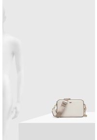 DKNY - Dkny torebka skórzana kolor biały. Kolor: biały. Dodatki: z breloczkiem. Materiał: skórzane. Rodzaj torebki: na ramię #4