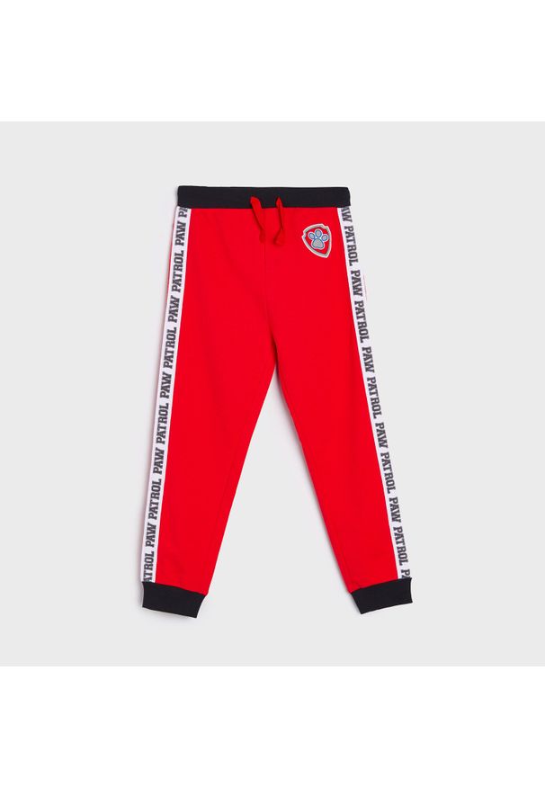 Sinsay - Spodnie dresowe Psi Patrol - Czerwony. Kolor: czerwony