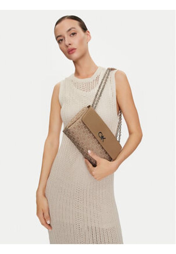 Calvin Klein Torebka Re-Lock Conv Shoulder Bag_Jqc K60K612641 Beżowy. Kolor: beżowy