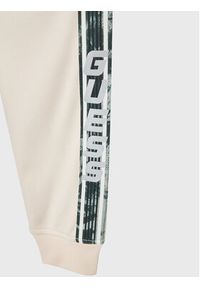 Guess Spodnie dresowe L2YQ18 KB6R2 Beżowy Regular Fit. Kolor: beżowy. Materiał: syntetyk #3